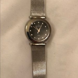 Skagen silver watch black face, crystal “numbers”